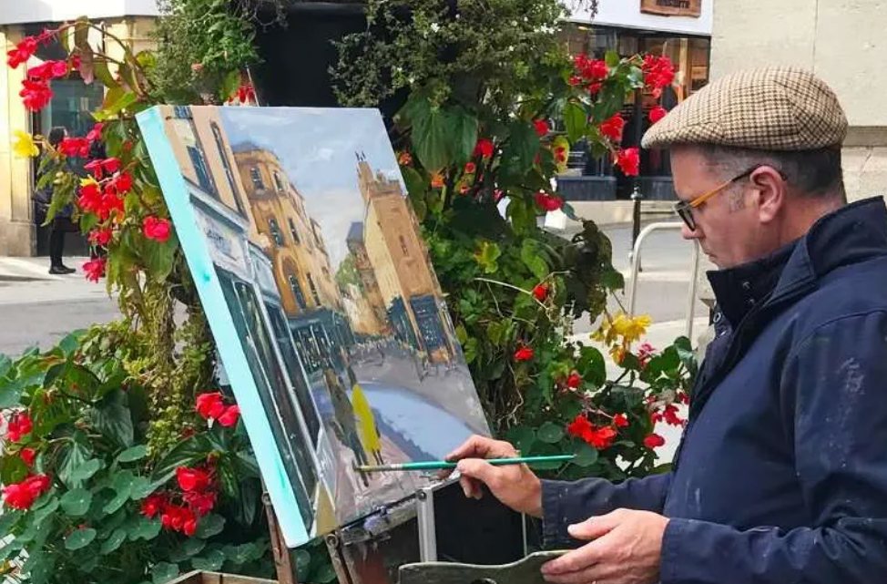 Gearoid Simms painting outdoors at an easel